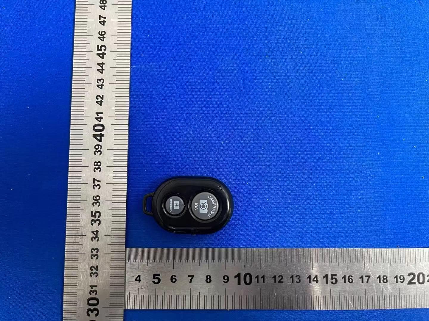 Bluetooth Remote Shutter - FCC ID 2A2AR-STG-6676-KB - DongGuan Xinvouc Electronic Co.Ltd