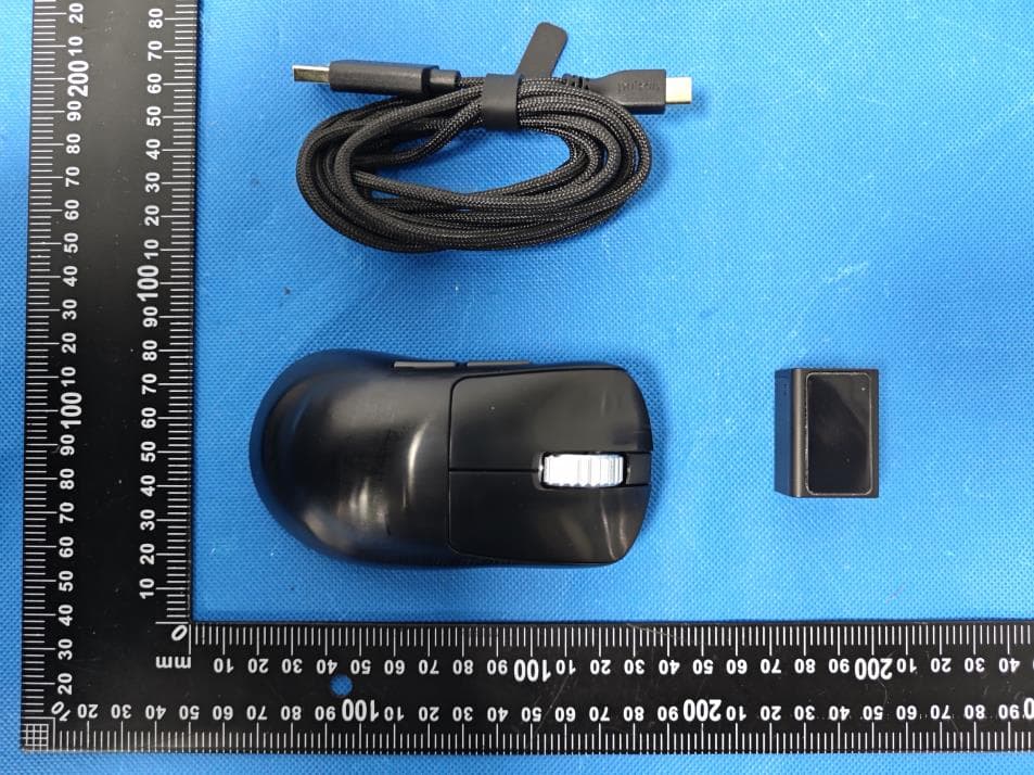 Pulsar Xlite v4 eS Mini Wireless Mouse - FCC ID 2A2TU-PXL4ES11 - AplusX Inc.