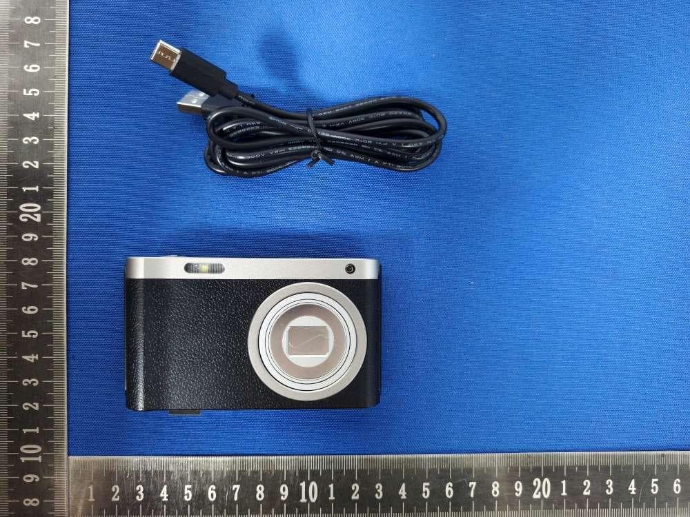 Optical zoom camera - FCC ID 2A3U8-DC128A1W - Shen Zhen Lian Zhong Xin Electronic Co., Ltd.