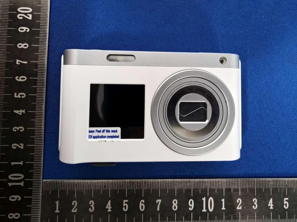 Optical zoom camera - FCC ID 2A3U8-DC128W - Shen Zhen Lian Zhong Xin Electronic Co., Ltd.