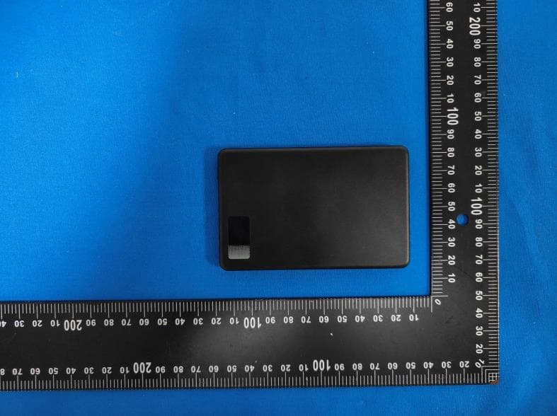 Ultra Slim 3-in-1 5000 mAh Wireless Power Bank w/ Digital Display - FCC ID 2A4C5-SJ-107 - Cosmo Fiber Corp.