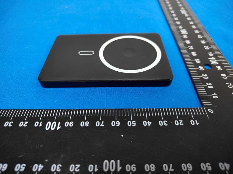 Ultra Slim 3-in-1 5000 mAh Wireless Power Bank w/ Digital Display - FCC ID 2A4C5-SJ-107 - Cosmo Fiber Corp. (3)