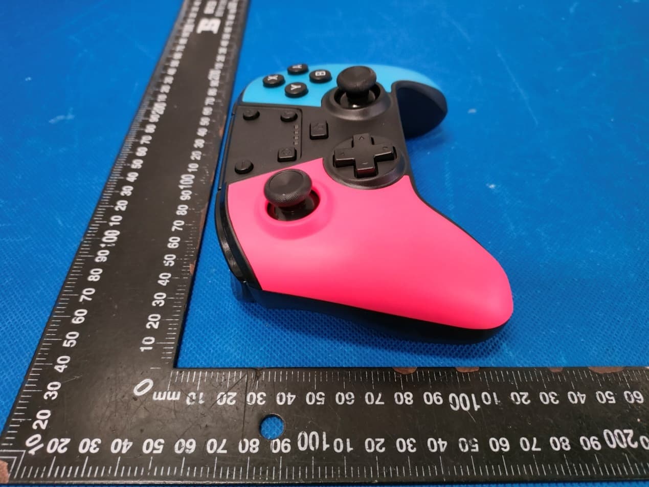Game console handle Wireless Controller - FCC ID 2A5UW-PGMC1NTN - Sound Around Inc. (5)