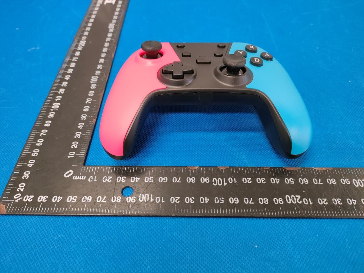 Game console handle Wireless Controller - FCC ID 2A5UW-PGMC1NTN - Sound Around Inc.