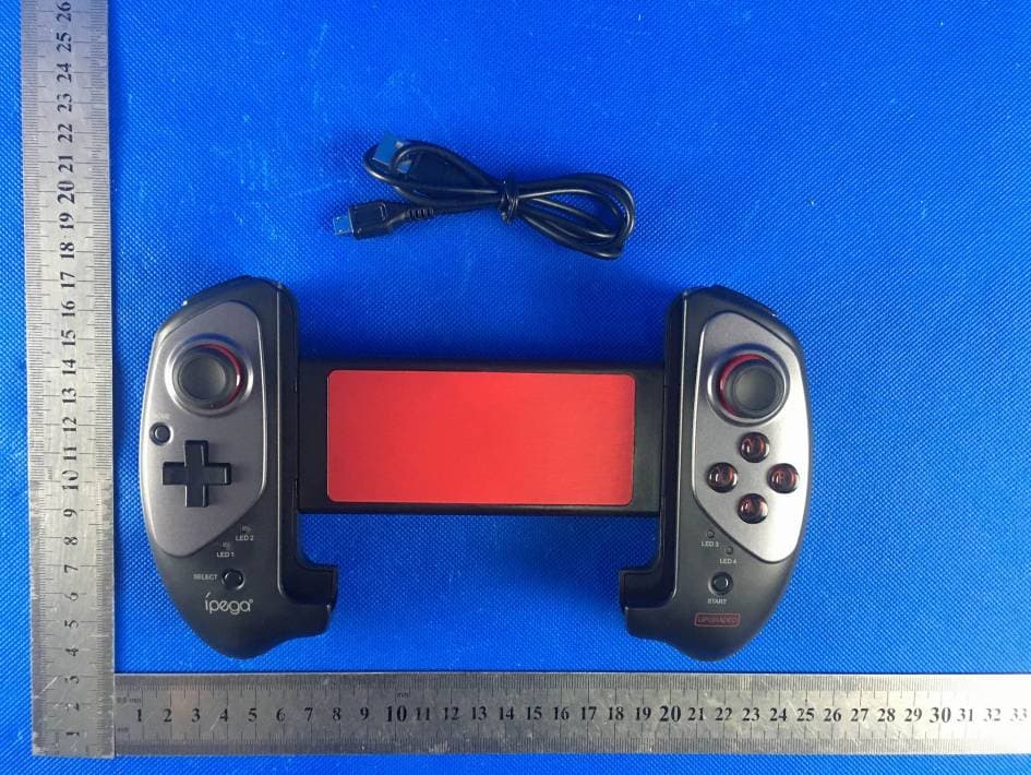 Wireless gamepad controller - FCC ID 2A62K-PG-9083S - Shenzhen Simhon Internet Business co., ltd.