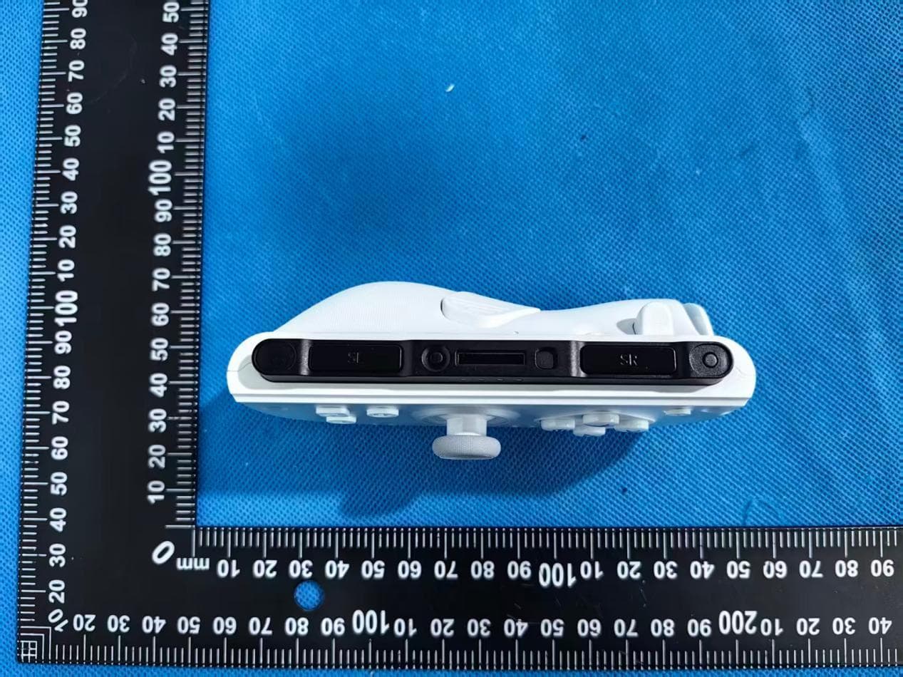 Left and right wireless gaming controllers - FCC ID 2A6EDAL-J30 - Shenzhen Jindinglong Technology Co., Ltd. (5)
