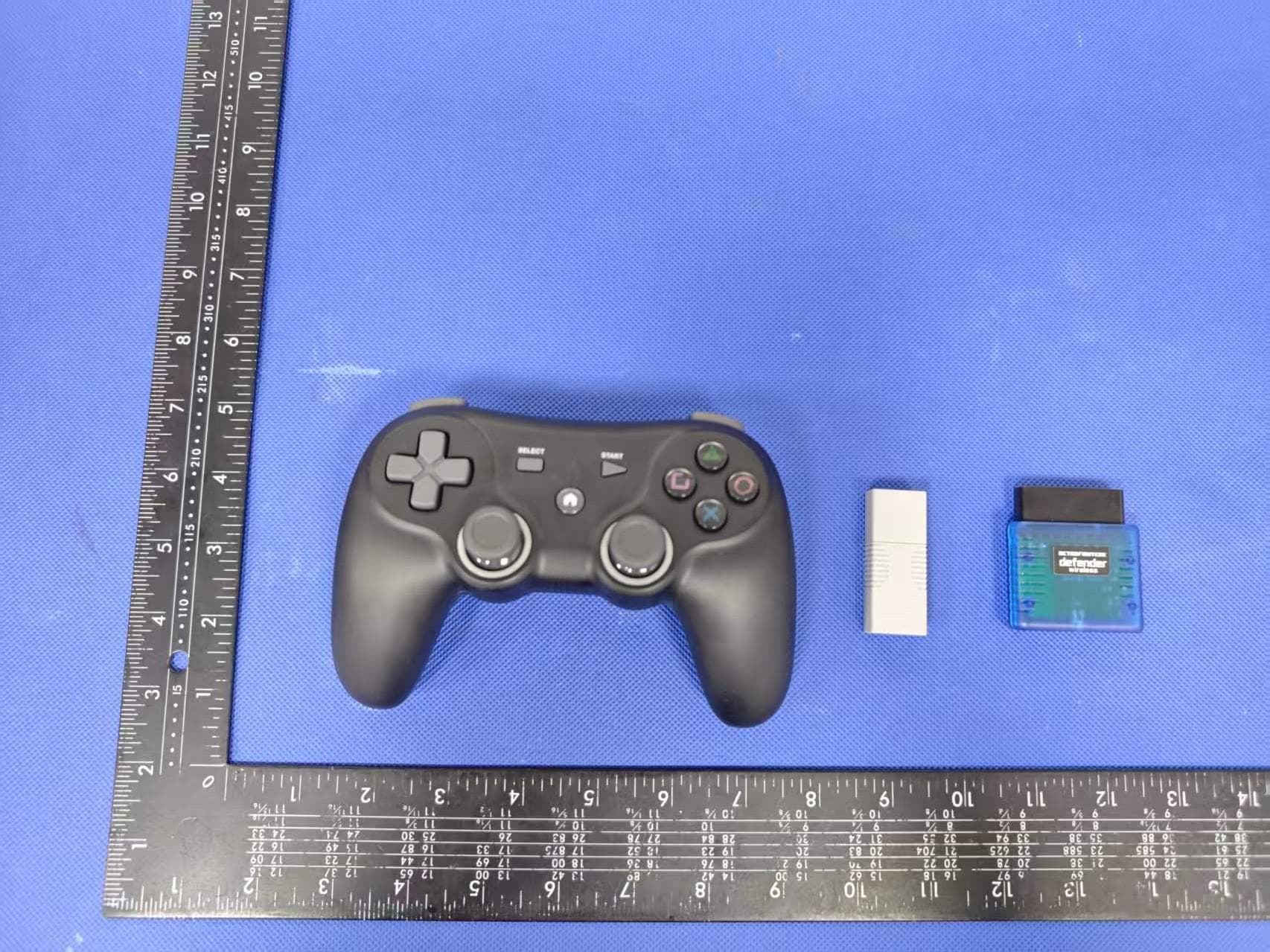 Bluetooth and 2.4g wireless gamepad for PS1/PS2/PS3/PC/Switch - FCC ID 2A6L7-DPRO - Grace Marketing Company