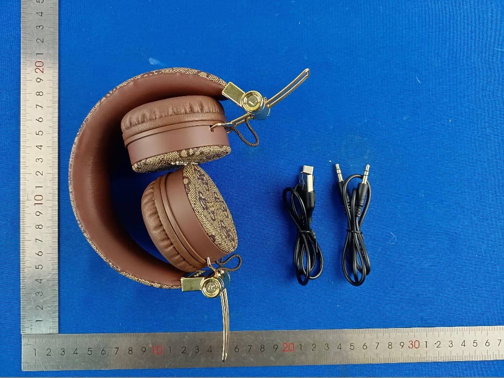 Wireless Headphone - FCC ID 2A7J2-GUBH704 - CG Mobile SAS