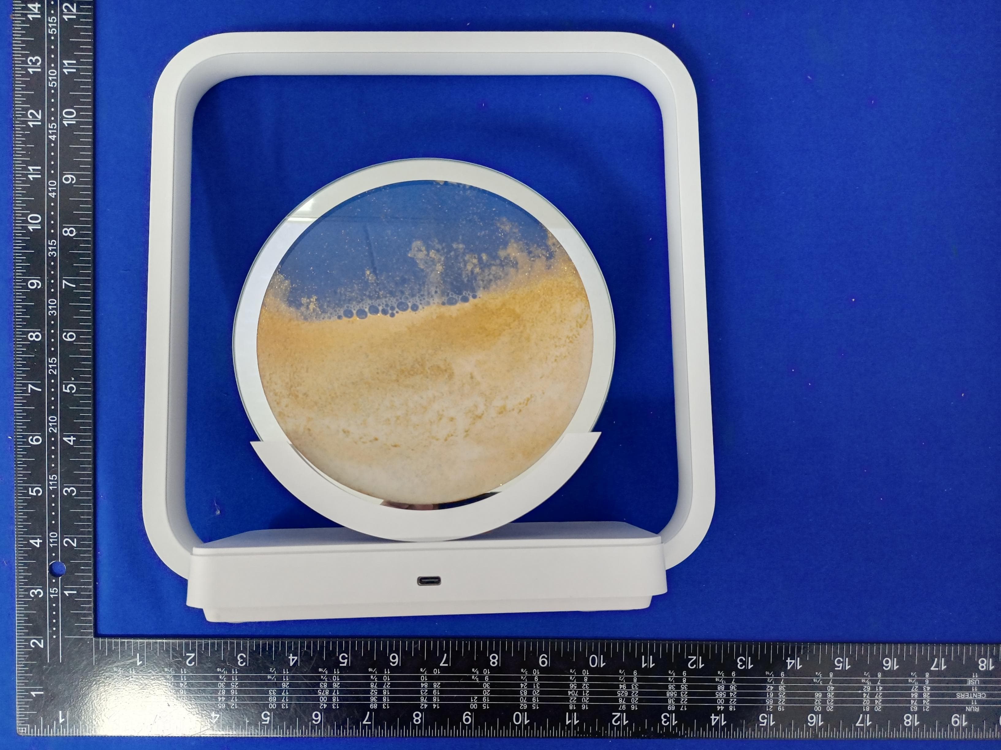 Wireless charging of quicksand painting desk lamp - FCC ID 2A8V2-AX-213 - Shenzhen Weiteshijia Technology Co., Ltd.