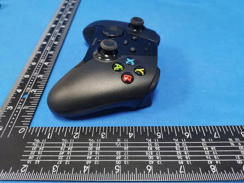Wireless Accessory Controller - FCC ID 2A9QT-RMTWL001 - liaochengchengxinpingmianshejiyouxiangongsi (2)