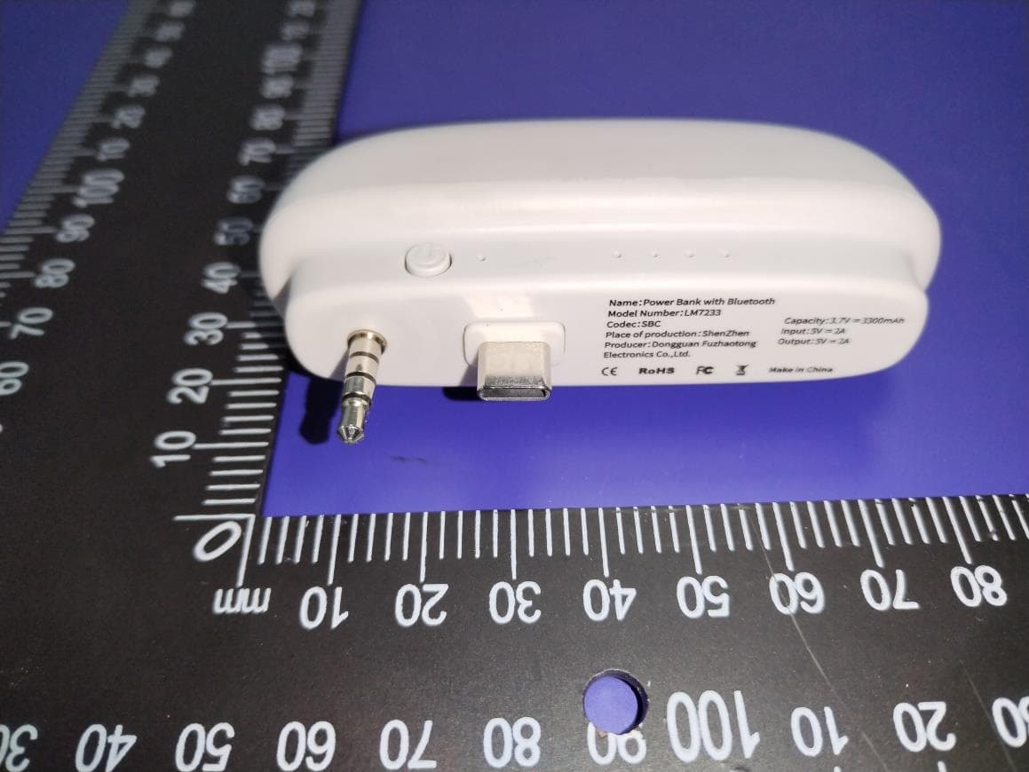 Power bank with Bluetooth - FCC ID 2A9VA-LM7233 - Guangzhou Aiwei E-commerce Co., Ltd (3)