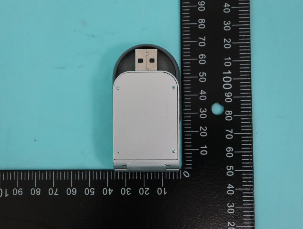 Flekto - compact folding Apple Watch charger - FCC ID 2AA7Y-MOSHIQI011 - Aevoe Inc.