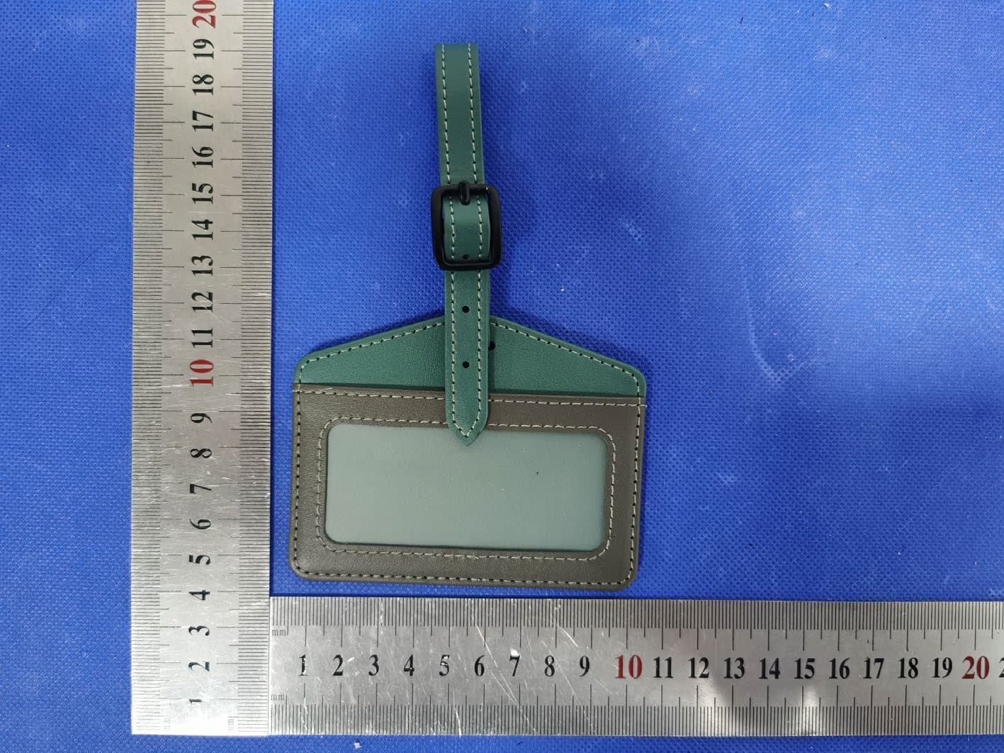 Luggage Finder Tag - FCC ID 2AA7Y-MOSHIQI013 - Aevoe Inc. (2)