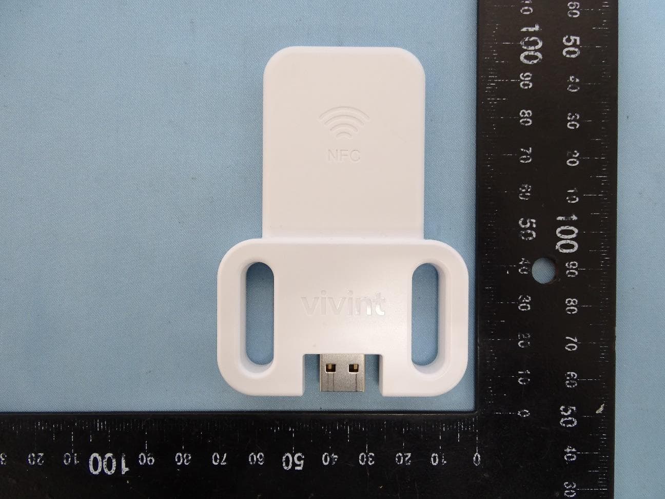 NFC dongle - FCC ID 2AAAS-US01 - Vivint, Inc.
