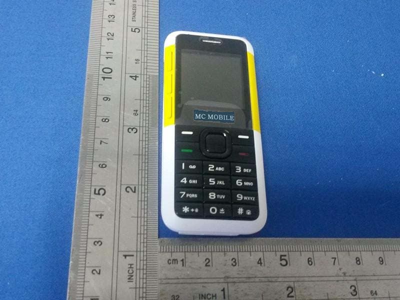 GSM Mobile Phone - FCC ID 2AACKSLIM - MC MOBILE E.U.