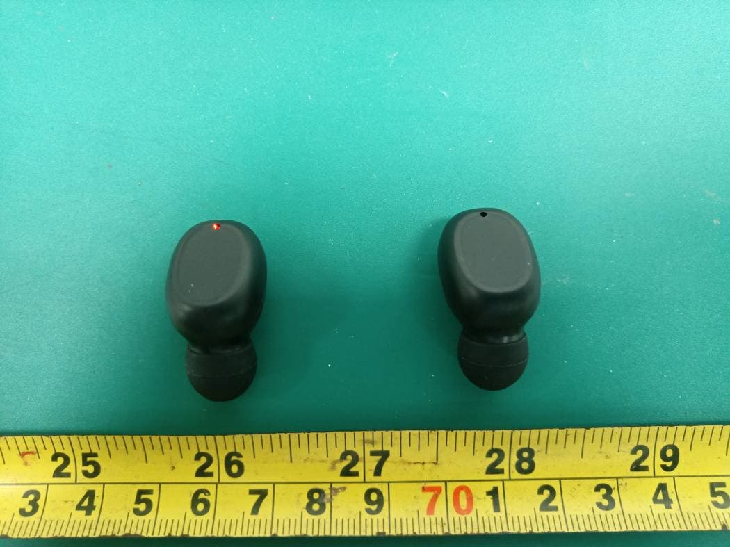 TWS EARBUDS WITH CHARGING CASE - FCC ID 2AANZSMTW - DGL Group LTD.