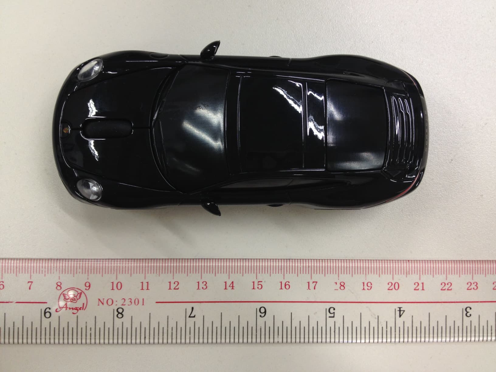 2.4GHz Wireless Optical Mouse in Car Style - FCC ID 2AAP995902 - Wellitec Development Ltd.