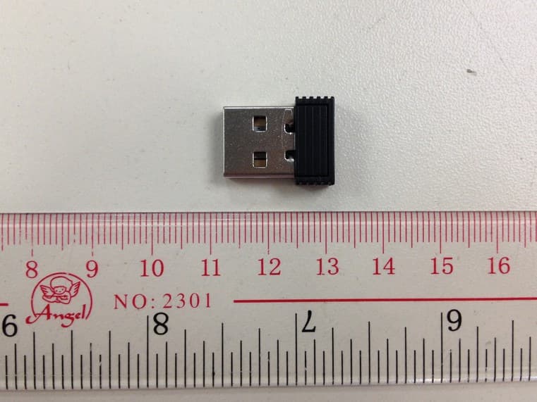 2.4GHz Dongle for Wireless Optical Mouse - FCC ID 2AAP9D - Wellitec Development Ltd.