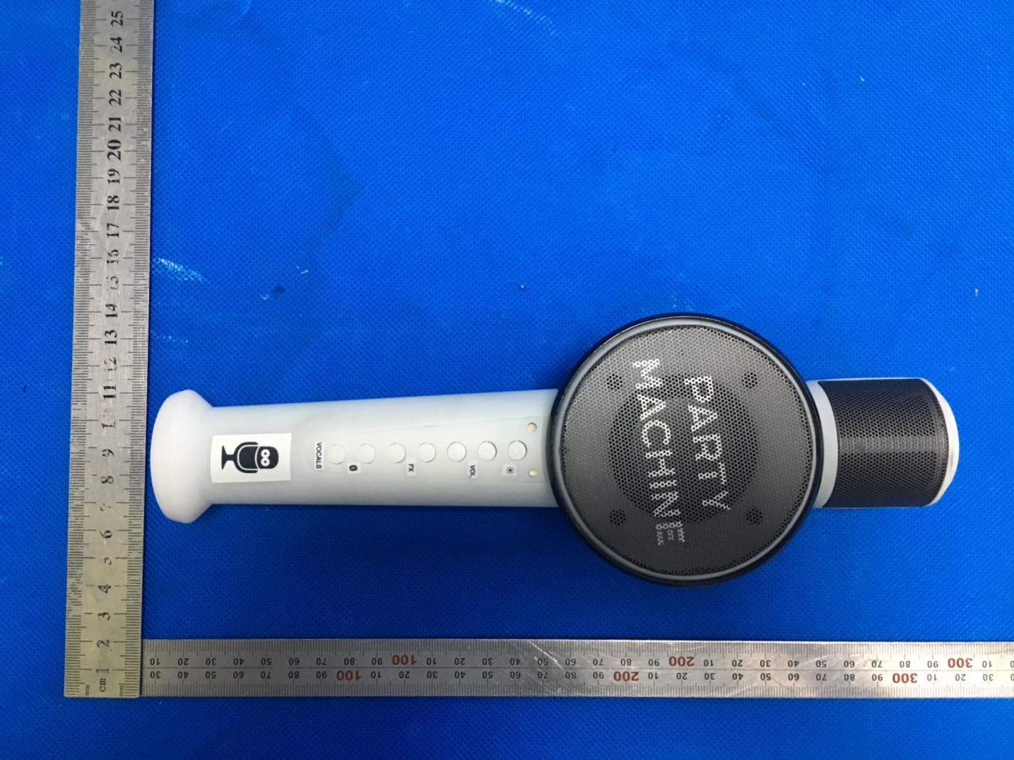 BLUETOOTH KARAOKE MICROPHONE - FCC ID 2AAXO-SMM548 - The Singing Machine Company, Inc. (2)