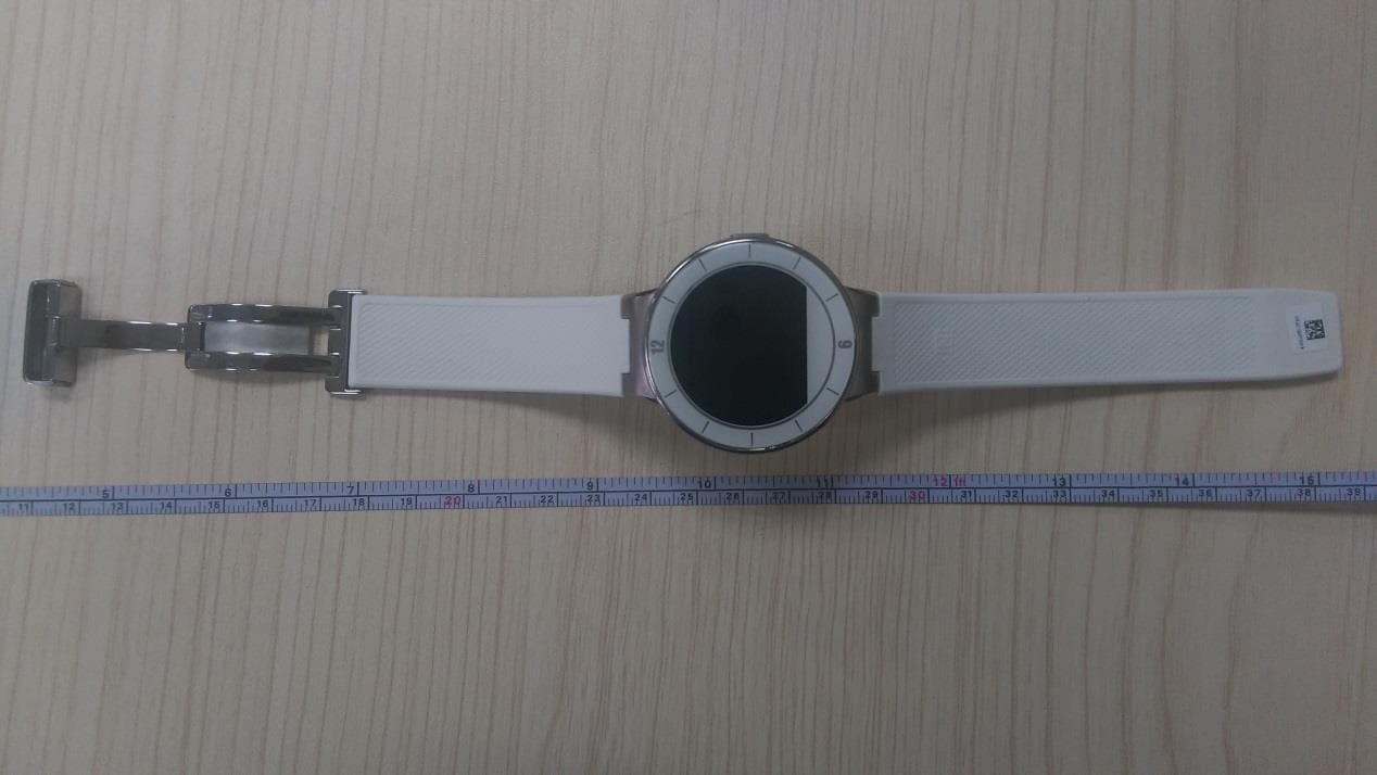 Connected wristband with Bluetooth technology - FCC ID 2ACCJA001 - TCL Communication Ltd. (3)