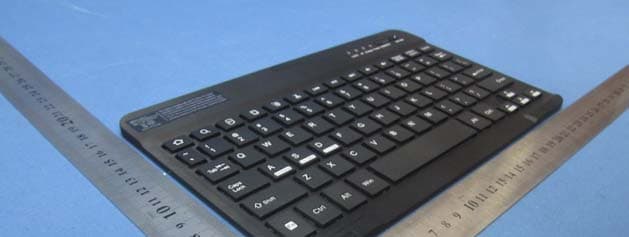 Bluetooth keyboard with case - FCC ID 2ACNAKBT970 - AHCOF INTERNATIONAL DEVELOPMENT CO.LTD (1)