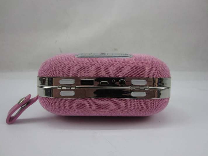 Bluetooth Speaker - FCC ID 2AD3J-MINICLUTCH - Da Chang Industries Co., Ltd (4)