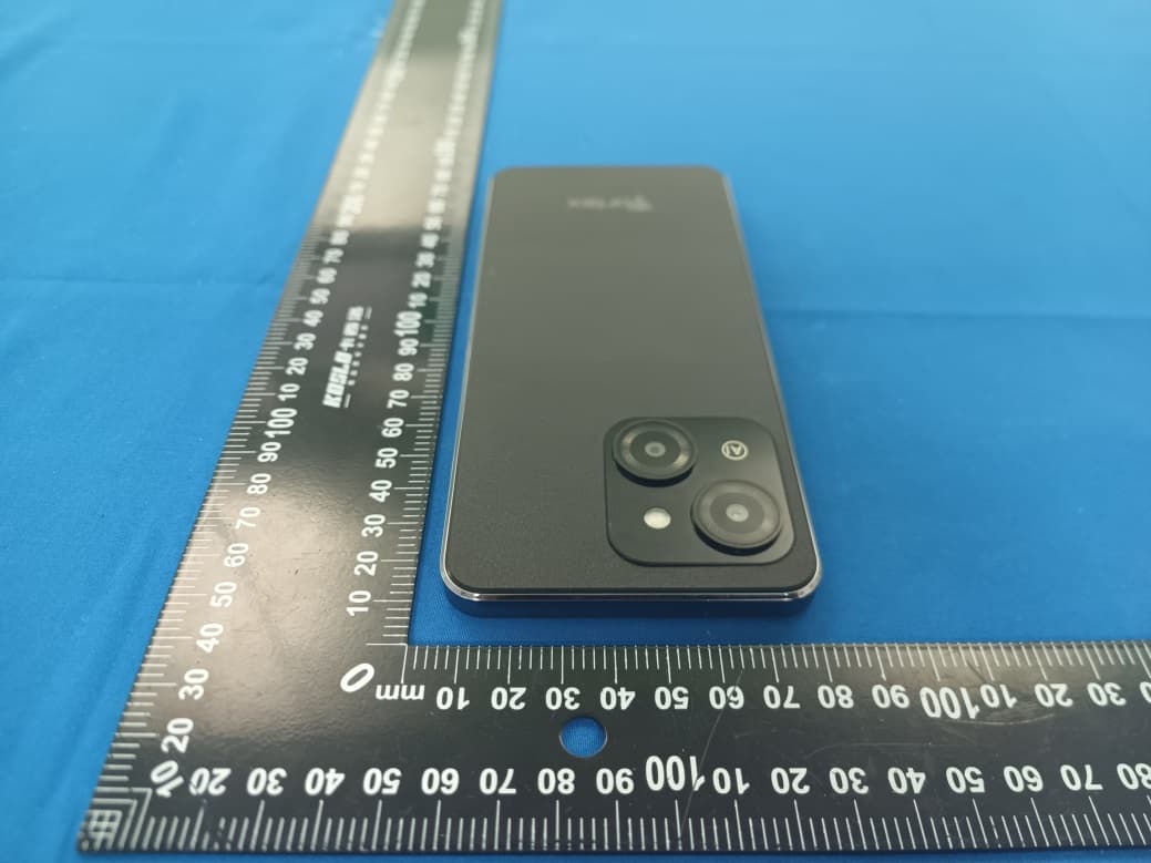 Mobile Phone - FCC ID 2ADLJ-CG65PRO - Xwireless LLC (5)