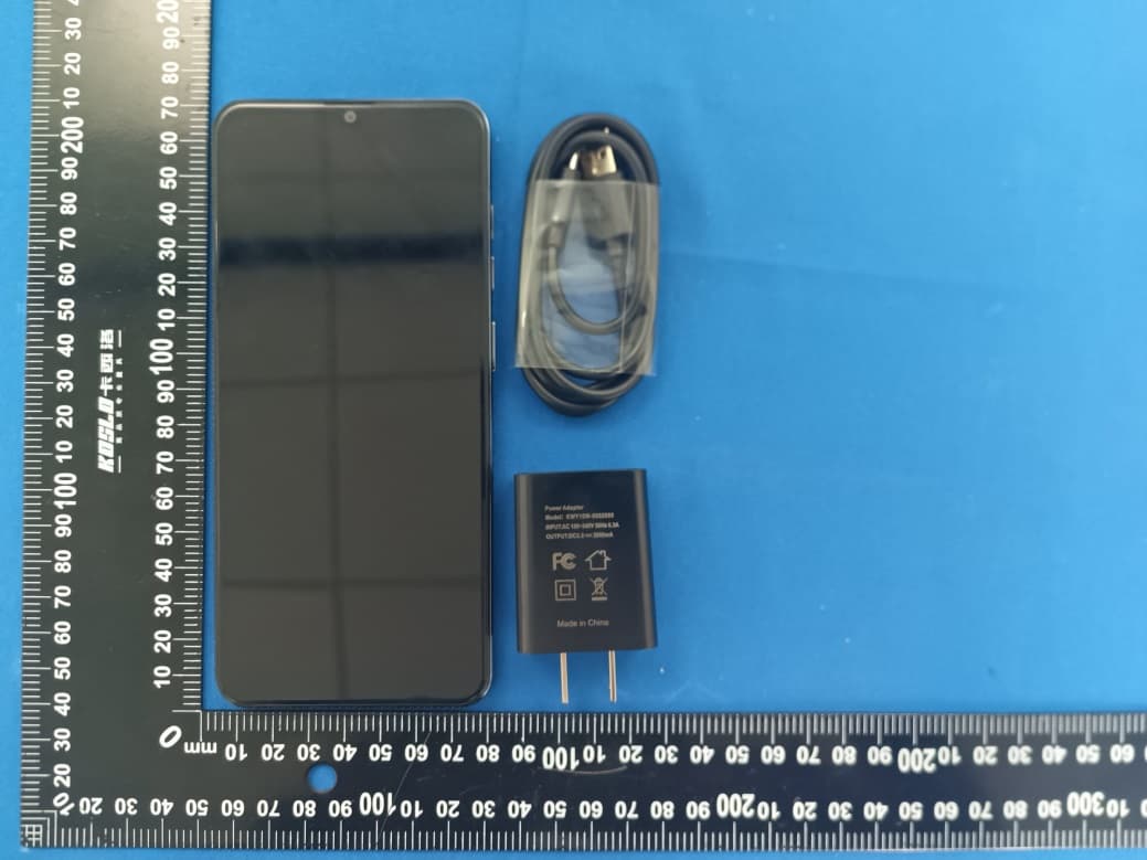 Mobile Phone - FCC ID 2ADLJ-CG65PRO - Xwireless LLC (4)