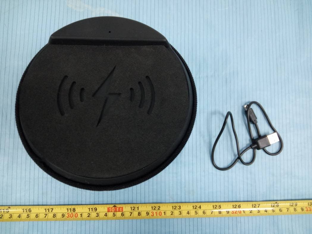 BT WIRELESS CHARGING SPKR - FCC ID 2ADM5-SP-0911 - Zeeva International Limited