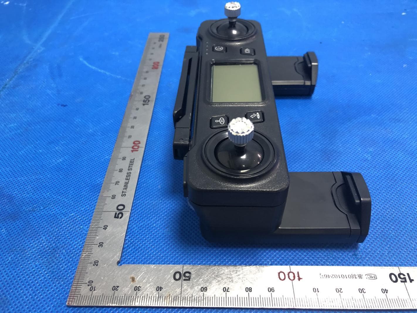 remote control - FCC ID 2AE8UASM01 - AOSENMA TOYS FACTORY (5)