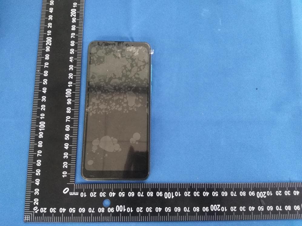 Mobile Phone - FCC ID 2AEJARAYOX1 - GSM GLOBE.COM INC (2)