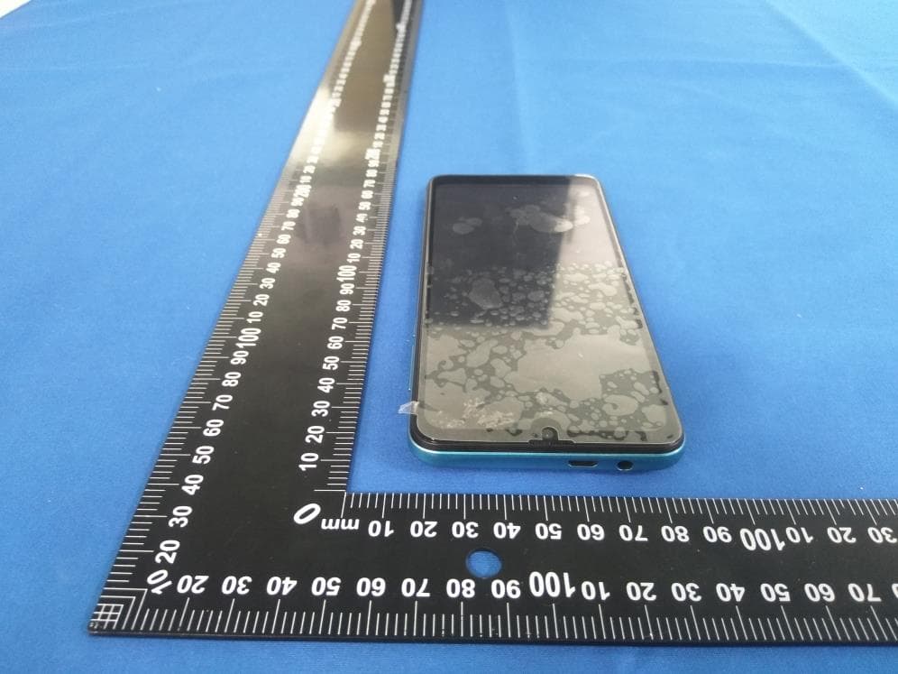 Mobile Phone - FCC ID 2AEJARAYOX1 - GSM GLOBE.COM INC (5)