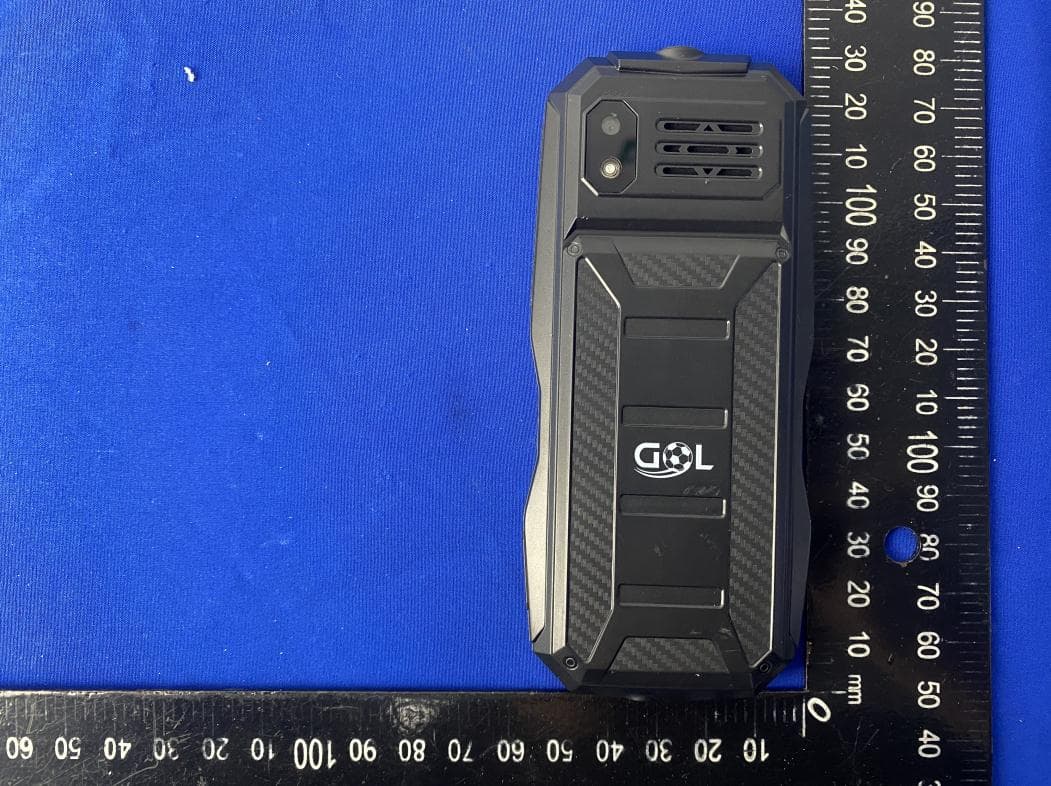 MOBILE PHONE - FCC ID 2AEJAXMANCHESTER - GSM GLOBE.COM INC