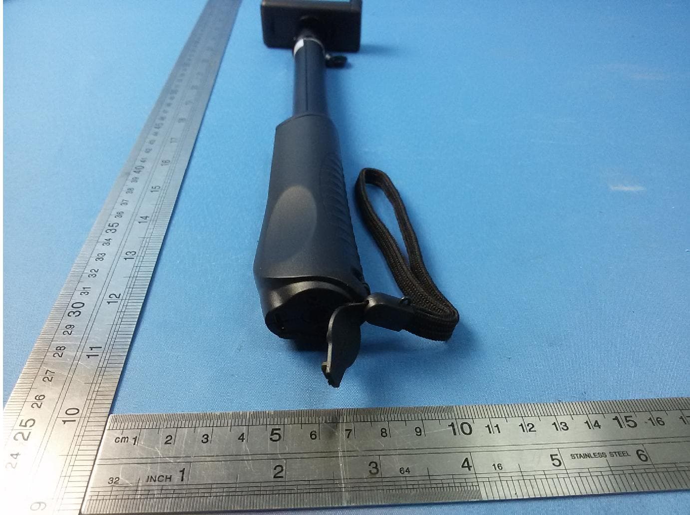 Bluetooth selfie stick - FCC ID 2AEJF-QP-940R - Zhongshan Laitu Photographic Equipment Co.,Ltd