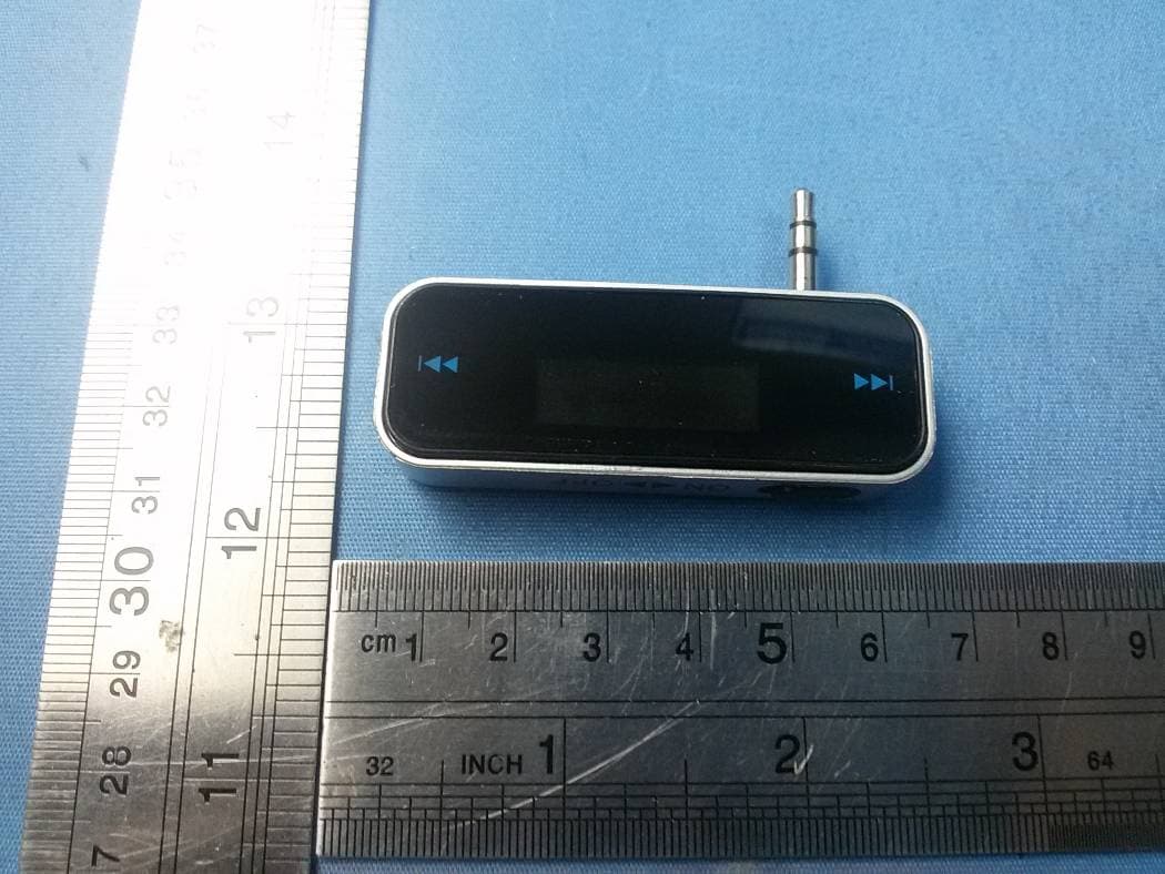 FM transmitter - FCC ID 2AFBDFM-09 - Ainovo Industry Limited (2)