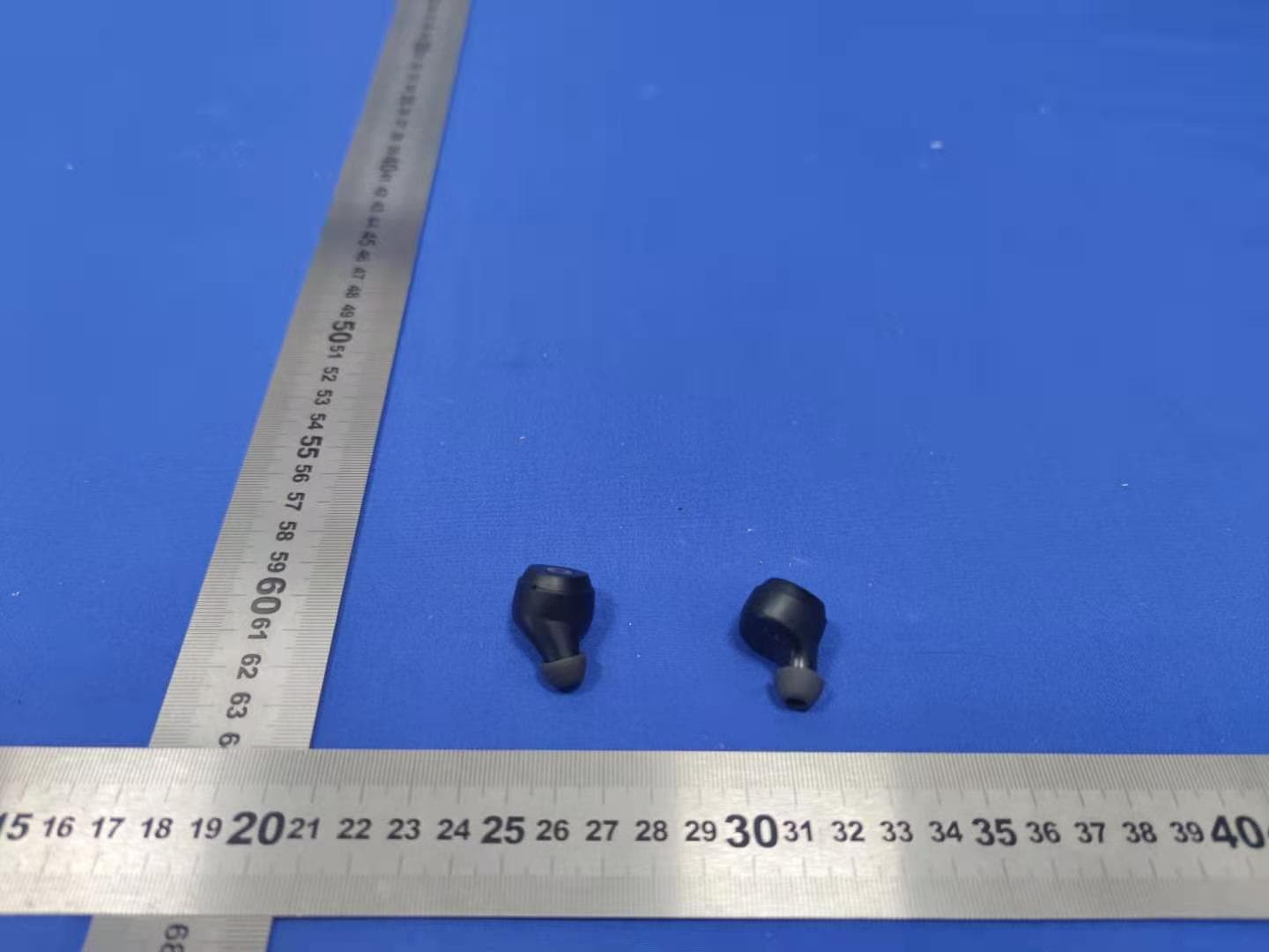 TWS Earphones - FCC ID 2AGHA3-Q65 - Shenzhen ABC Industrial Co., Ltd. (5)
