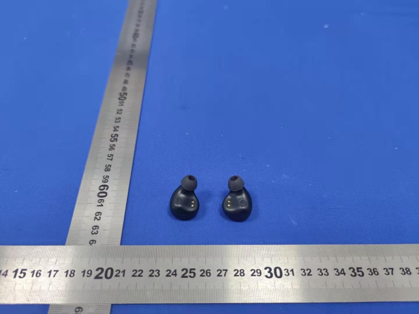TWS Earphones - FCC ID 2AGHA3-Q65 - Shenzhen ABC Industrial Co., Ltd. (3)