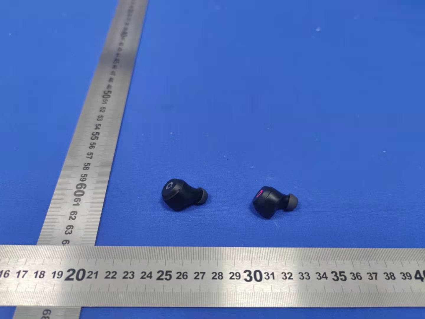 TWS Earphones - FCC ID 2AGHA3-Q65 - Shenzhen ABC Industrial Co., Ltd. (2)
