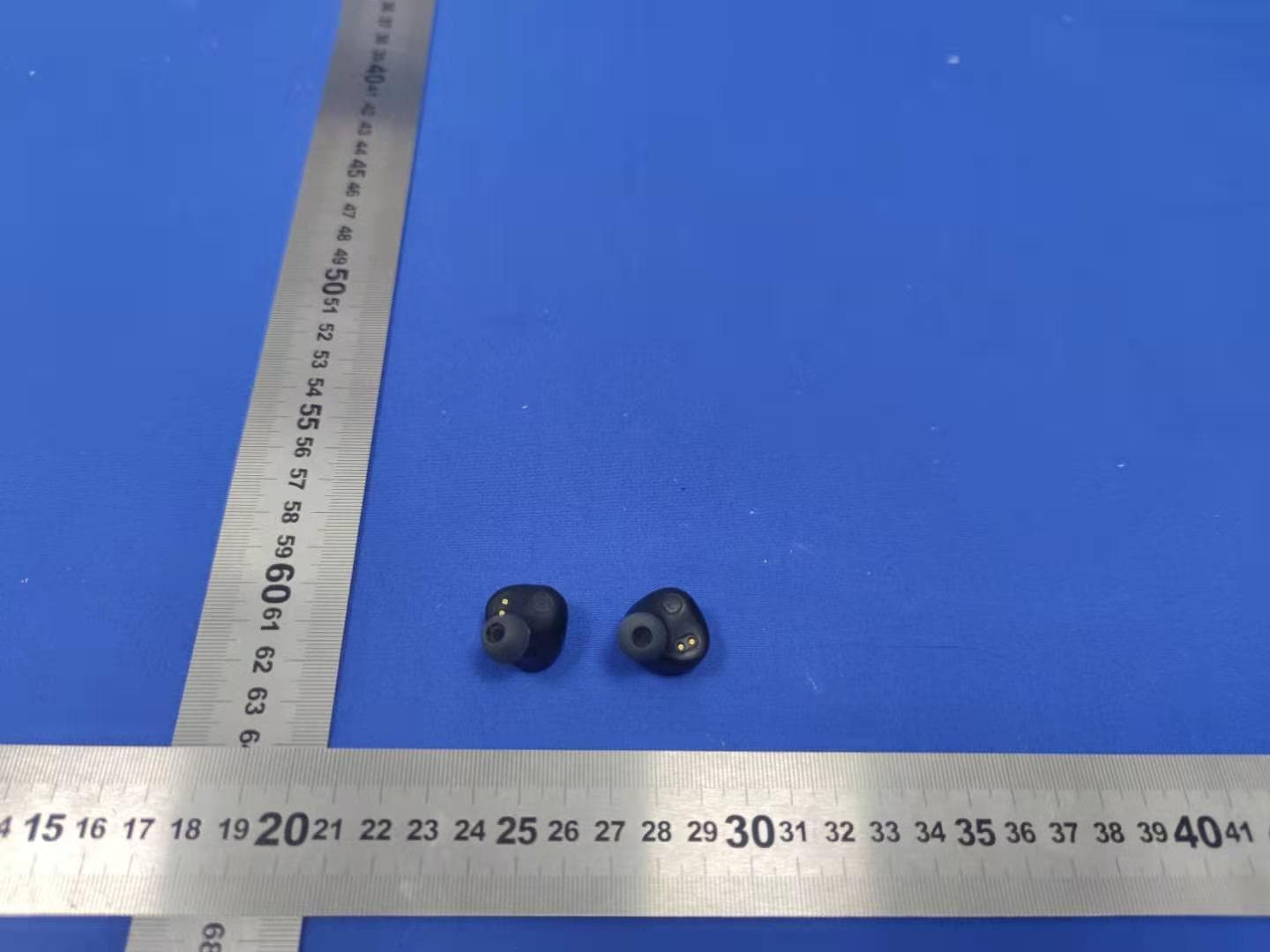 TWS Earphones - FCC ID 2AGHA3-Q65 - Shenzhen ABC Industrial Co., Ltd. (4)