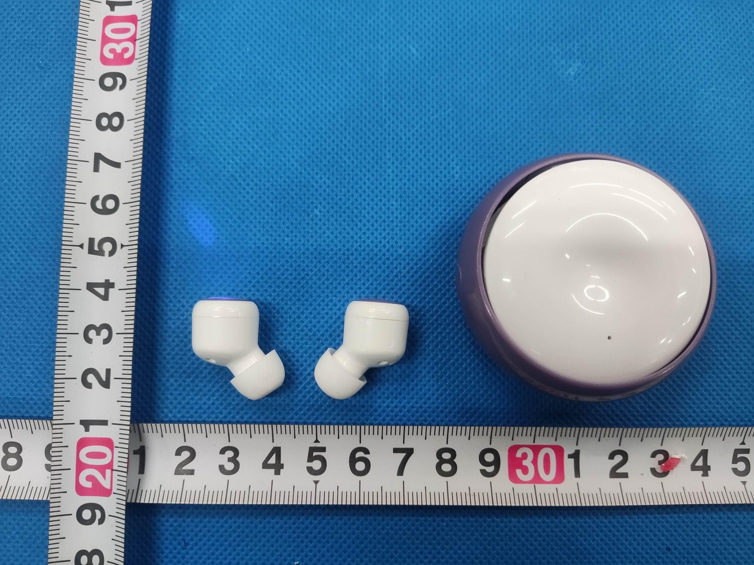 TWS Spinner Earbuds - FCC ID 2AHN6-AUBE227 - Bytech NY Inc.