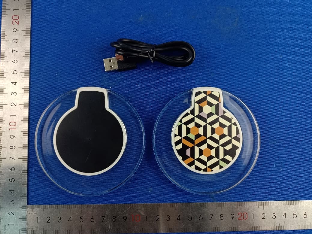 Wireless chrg puck 10W - FCC ID 2AHN6-OPCP100 - Bytech NY Inc. (2)