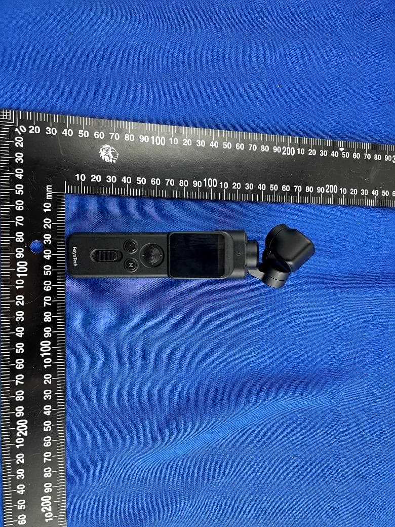 Remote Handle for Feiyu Pocket 3 - FCC ID 2AHW7-FEIYUVCAM3SRH - Guilin  Feiyu Technology Incorporated Company