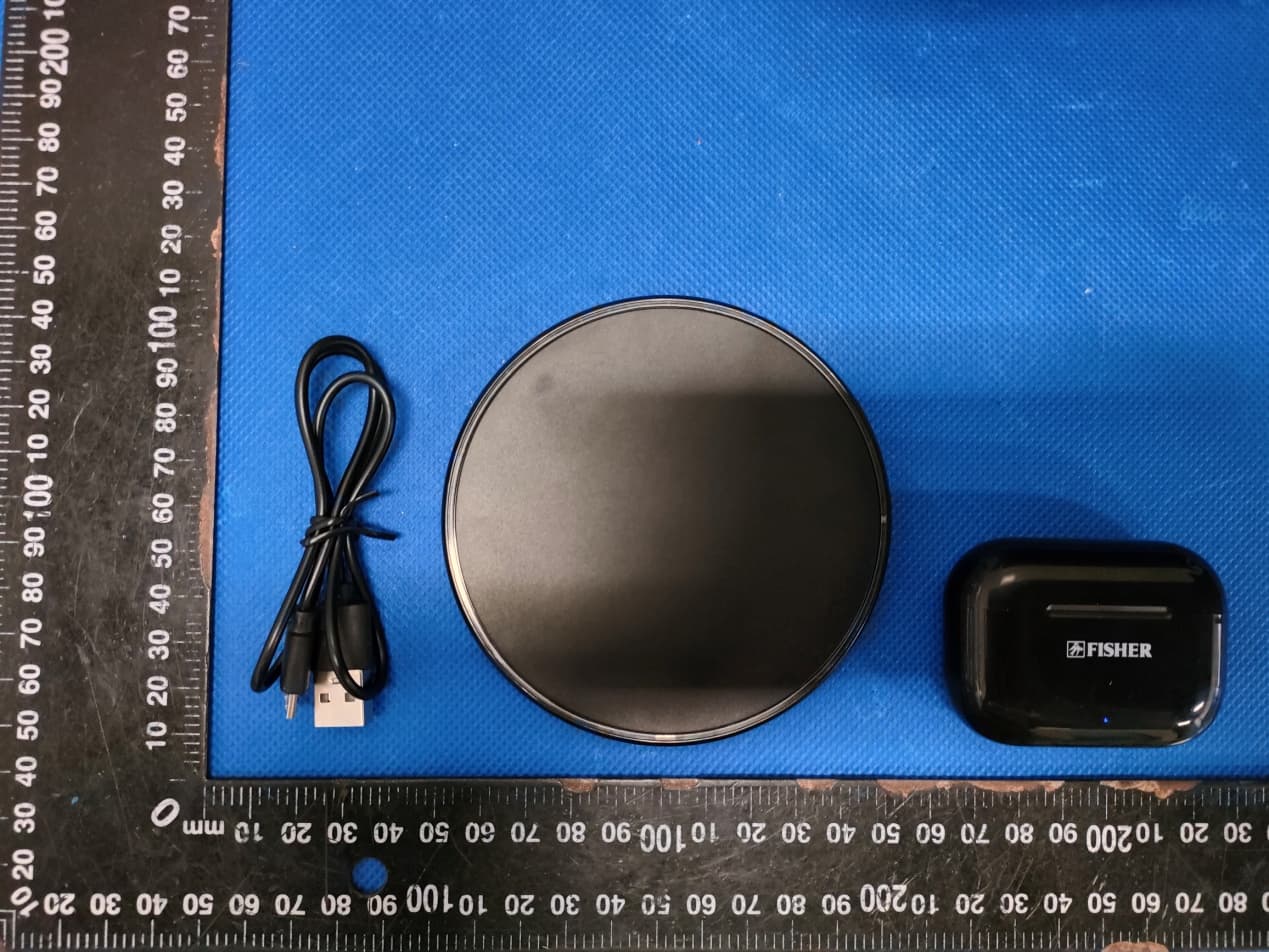 Wireless charger - FCC ID 2AIDL-SS-FTWI600 - Migear International Group LLC