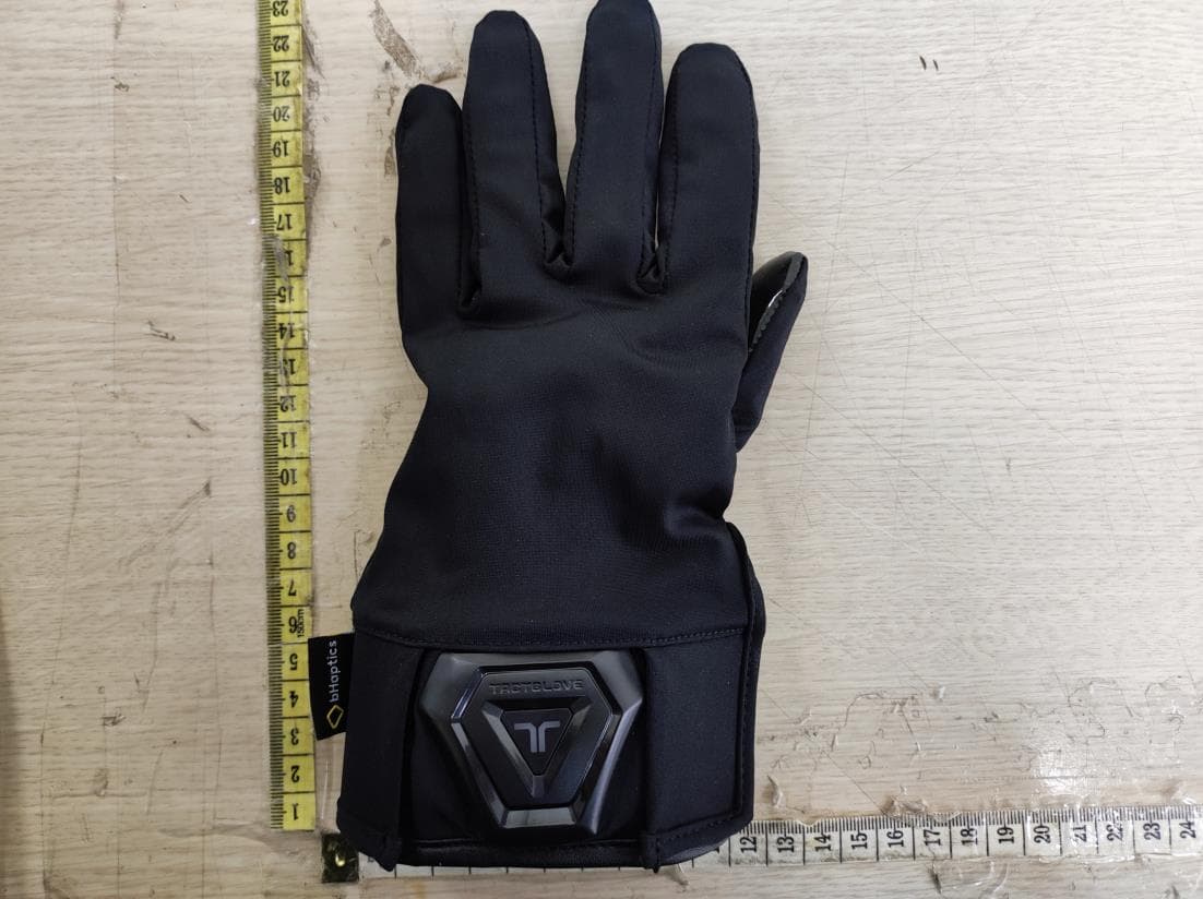 Haptic glove - FCC ID 2AJ6BBHTG06D100 - bHaptics Inc. (4)