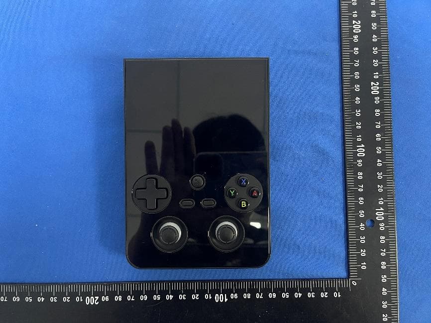 Handheld Game Console - FCC ID 2AJU8-RG477V - Shenzhen Yangliming Electronic Technology Co., Ltd. (3)