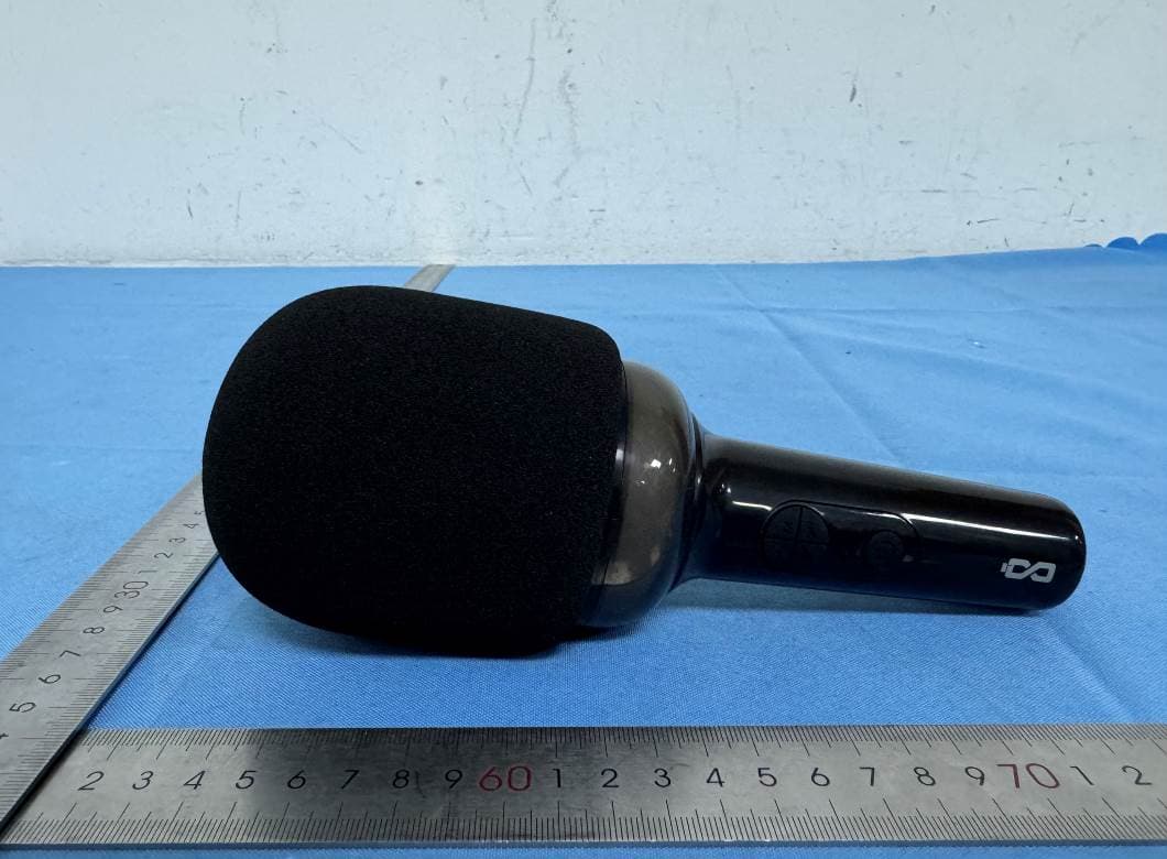 LED Karaoke Microphone with Built-In Speaker - FCC ID 2AJVKKH210 - Foto Electric Supply Co., INC. (4)