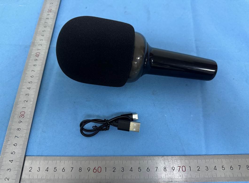 LED Karaoke Microphone with Built-In Speaker - FCC ID 2AJVKKH210 - Foto Electric Supply Co., INC.