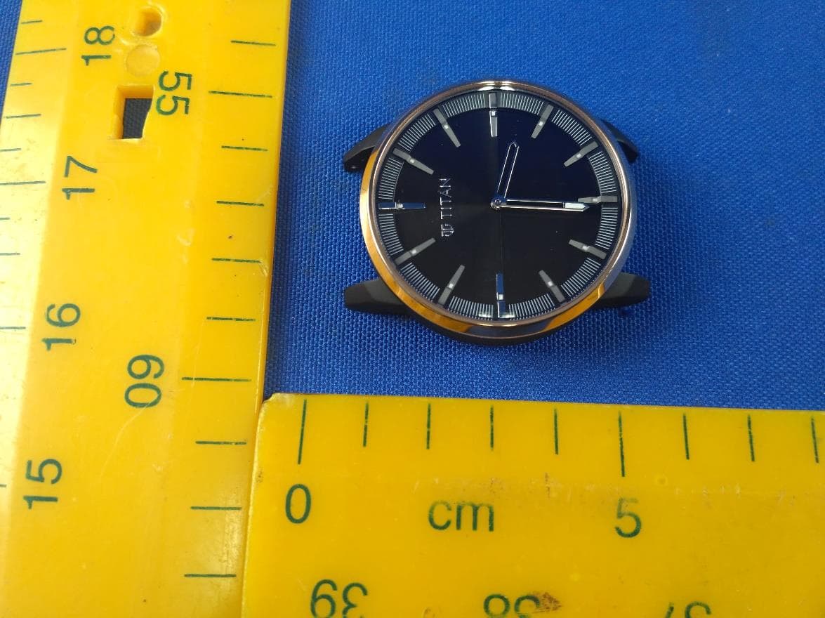 Smart Watch with BLE function - FCC ID 2AK9F-90120 - Titan Company Limited (2)
