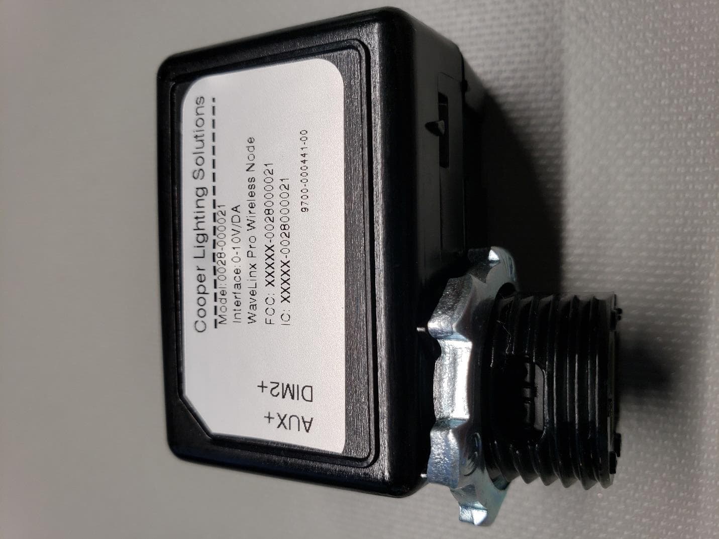 Wavelinx Pro Wireless Node - FCC ID 2AKCY-0028000021 - Cooper Lighting LLC (2)