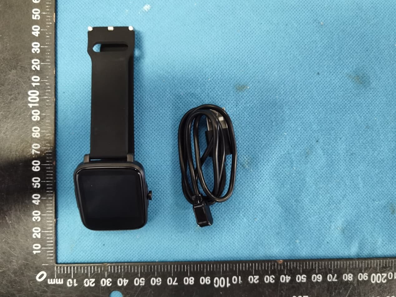 Smart watch - FCC ID 2AKUO-IML - Shenzhen Smart Care Technology Limited (2)
